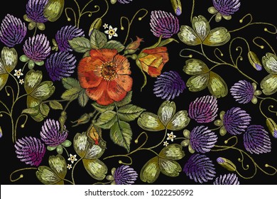 Embroidery roses and pantone clover seamless pattern. Classical beautiful flowers clover and red roses spring flowers pattern. Fashionable template for design of clothes, t-shirt template 