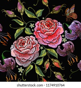 Embroidery roses and tiger lillies seamless pattern. Template for clothes, textiles, t-shirt design. Beautiful pink roses flowers and tiger lillies classical embroidery on black background