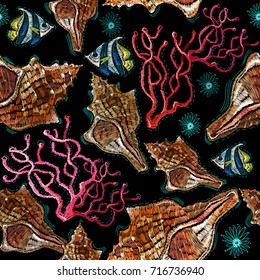 Embroidery sea life, sea shells, corals, tropical fishes seamless pattern. Fashionable clothes, t-shirt design. Classical embroidery tropical sea, wave, fishes corals, shells seamless fashion pattern