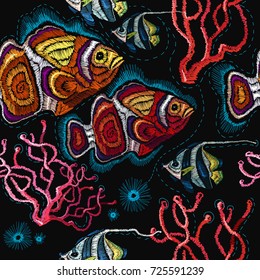 Embroidery sea life, sea shells, corals, clown fish, tropical fishes seamless pattern. Classical embroidery tropical sea, wave, fishes, corals, shells seamless fashion pattern. Fashionable clothes 