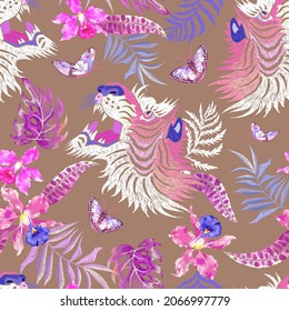 Embroidery seamless floral pattern with tiger and tropical leaves and orchids. Vector seamless embroidered template for fashion design.