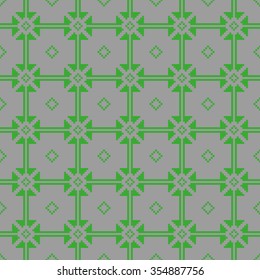 Embroidery seamless green pattern on a grey background. Vector illustration