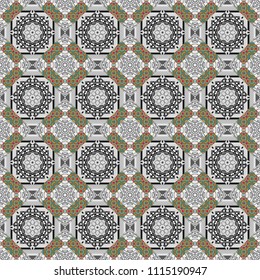 Embroidery seamless pattern with abstract diagonal tiles. Vector ornament in green, gray and black colors. Embroidery for fashion textile and fabric.