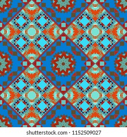 Embroidery seamless pattern with abstract diagonal tiles. Vector ornament in red, blue and green colors. Embroidery for fashion textile and fabric.