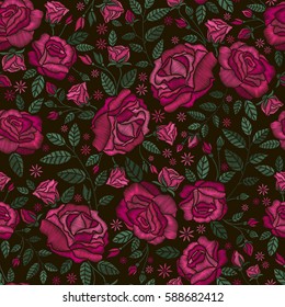 El bordado es un patrón impecable con bellas flores. Borde de de rosas vectoriales sobre fondo negro. Bordado para la moda textil y de tela.