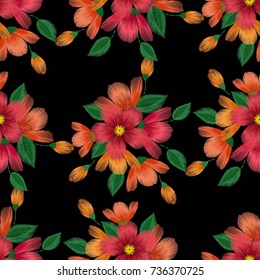 Embroidery seamless pattern with beautiful flowers. Vector floral ornament on black background. Embroidery for fashion textile and fabric.