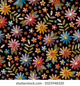 Embroidery seamless pattern with beautiful wild flowers. Summer print. Fashion design. Vector embroidered illustration.