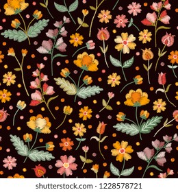Embroidery seamless pattern with beautiful wild flowers. Summer print. Floral embroidered design. Vector illustration.
