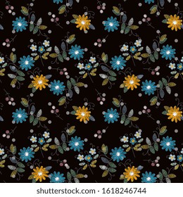 Embroidery seamless pattern with blue and yellow flowers. Beautiful vector print for fabric and textile. Fashion design.