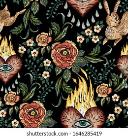 Embroidery seamless pattern with flowers, hearts and hares . Vector embroidered floral bouquet on white background for clothing design.
