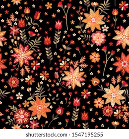 Embroidery seamless pattern with flowers and leaves in  warm colors. Print for fabric and textile for cozy home. Trendy design for clothes.