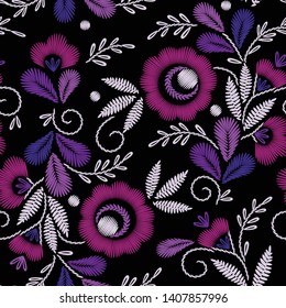 Embroidery seamless pattern. Folk chic floral background. Colorful vector illustration
