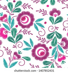 Embroidery seamless pattern. Folk flowers on white background. Colorful vector illustration