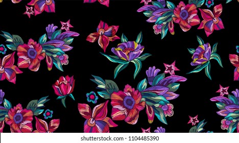 Embroidery seamless pattern with modern bright flowers. Vector embroidered floral patch for clothing design.