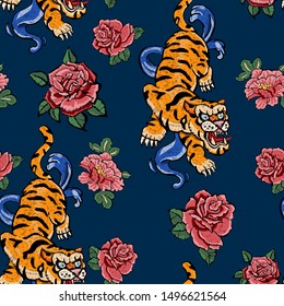 Embroidery seamless pattern with oriental tigers and flowers. Vector embroidered floral patch.