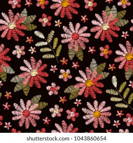 Embroidery seamless pattern with pink flowers and green leaves on black background. Romantic floral design for fabric, textile, wrapping paper, print, cards. Vector illustration.