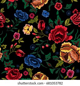 Embroidery seamless pattern with red and blue roses. Vector embroidered floral bouquet sketch with flowers for clothing design