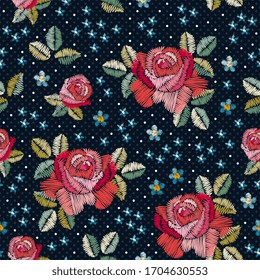 Embroidery seamless pattern with rose and forget-me-not flowers. Print for fabric. Vector embroidered illustration.