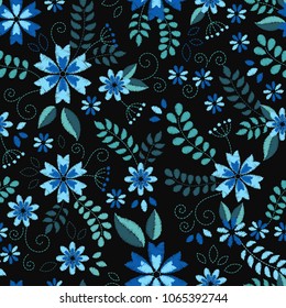 Embroidery seamless pattern texture wallpaper, background, with cute flowers and leaves. Vector floral ornament on black background. Template for design, printing, textiles, clothing
