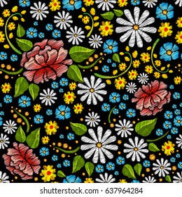 Embroidery seamless pattern. Vector floral ornament on black background for  textile and fabric.