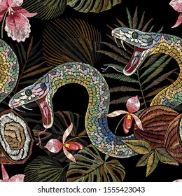 Embroidery snake, coconut and tropical orchid flowers seamless pattern. Fashion template for clothes, textiles, t-shirt design. Summer jungle art 