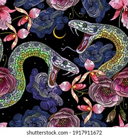 Embroidery snake, roses and tropical orchid flowers seamless pattern. Summer jungle art. Tropical night. Fashion template for clothes, textiles, t-shirt design 