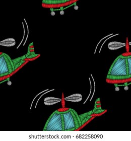 Embroidery stitches imitation seamless pattern with helicopter. Vector embroidery traditional helicopter on black background.