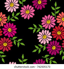 Embroidery stitches imitation seamless pattern with flower. Fashion embroidery flower on black background. Vector seamless floral print.