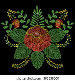 Embroidery stitches with orange rose flowers, grass, branches. Vector fashion embroidered ornament on black background for textile, fabric traditional folk floral decoration.