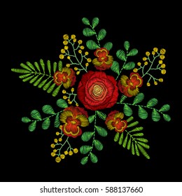 Embroidery stitches with orange spring flowers, wildflowers, rose, grass, branches. Vector fashion embroidered ornament on black background for textile, fabric traditional folk floral decoration.