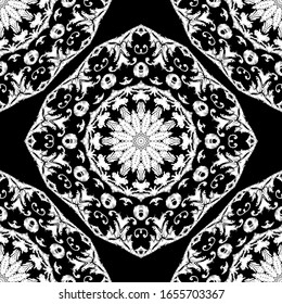 Embroidery textured vector seamless pattern. Black and white floral grunge background. Tapestry wallpaper. Damask flowers, leaves, mandalas. Hatched vintage baroque ornaments. Embroidered texture.