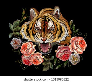Embroidery tiger head and beautiful spring roses flowers. Fashion animals. Clothes, textile design template 