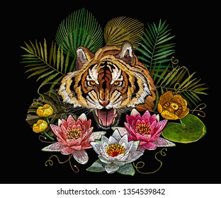 Embroidery tiger head and lotus and water lilies. Template for clothes, textiles, t-shirt design 