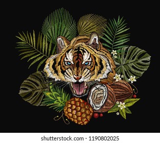 Embroidery tiger in the jungle, palm tree leaves, pineapple, coconut tropical art. Fashionable template for clothes, t-shirt design. Embroidery angry tiger face 