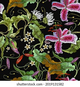 Embroidery tiger lilies flowers. Summer jungle seamless pattern. Floral fashion template for clothes, textiles, t-shirt design. Pink tropical orchids. 