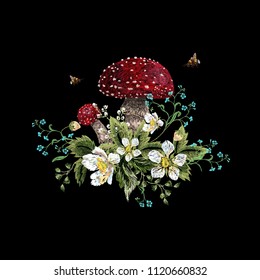Embroidery traditional floral pattern with mushroom, berries, forget me not and bees. Vector embroidered bouquet with flowers for wearing design.