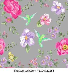 Embroidery trend floral seamless pattern with roses, hummingbirdsviolets and violets. Vector traditional folk flowers decor on gray background for clothing design.
