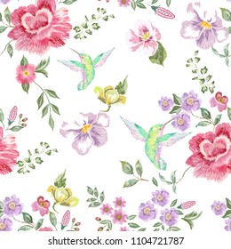 Embroidery trend floral seamless pattern with roses, violets and hummingbirds. Vector traditional folk flowers decor on white background for clothing design.