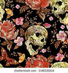 Embroidery trend floral seamless pattern with roses, skulls, violets and butterflies. Vector traditional folk flowers decor on black background for clothing design.