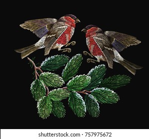 Embroidery two red bullfinches and fir-tree branches. Merry Christmas classical embroidery snow-covered branch of a fir-tree. Christmas fashion t-shirt art 