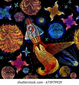 Embroidery universe seamless pattern. Rocket, planet, solar system, galaxy. Space embroidery, planet and space rockets. Childish background t-shirt design 