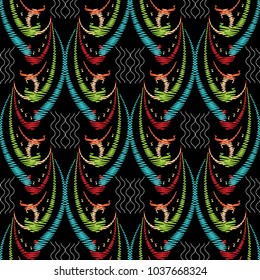 Embroidery vector seamless pattern. Colorful tapestry hand drawn flowers, swirl leaves, grunge ornaments. Black floral background. Embroidered bright design for wallpapers, textile. Tapestry flowers.
