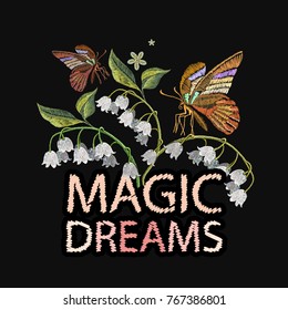 Embroidery white snowdrops and butterflies. Magic dreams slogan. Classical embroidery white hand bells and tropical butterflies. Fashion template for clothes, textiles, t-shirt design
