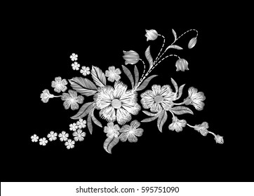 Embroidery white wild flowers on a black background. imitation lace. fashionable clothing decoration. traditional pattern. vector illustration