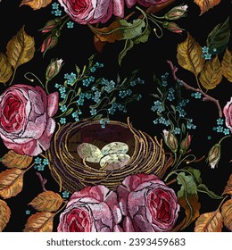 Embroidery. Wild pink roses, meadow herbs, autumn leaves and bird nest with eggs. Fall garden art. Fashion seamless pattern. Template for design of clothes, tapestry