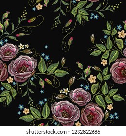 Embroidery wild roses seamless pattern. Beautiful red roses fashionable template tapestry vector 