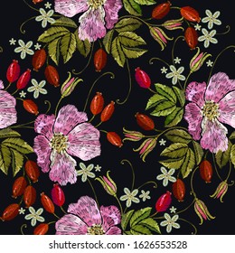 Embroidery wild roses, seamless pattern. Template for clothes, textiles, t-shirt design. Beautiful summer flowers. Garden art
