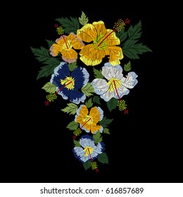 Embroidery of yellow, blue hibiscus. Folk ornament.