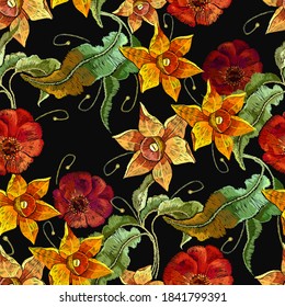 Embroidery yellow narcissuses and red roses flowers, seamless pattern. Template for clothes, textiles, t-shirt design. Beautiful spring daffodils on black background. Botanical vector illustration 