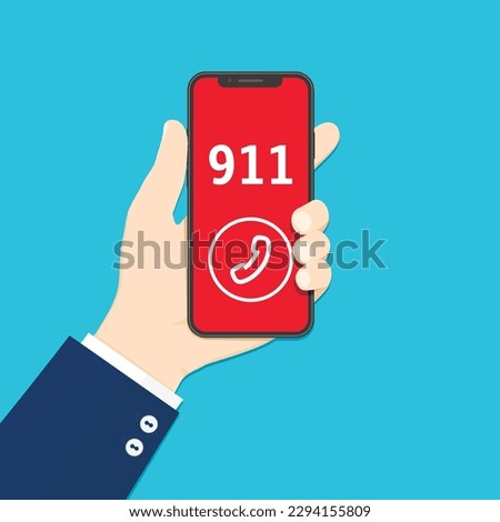 Emergency call. Hand holding smartphone with emergency number 911 on the screen.